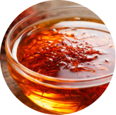 Saffron extract steeping in a glass bowl